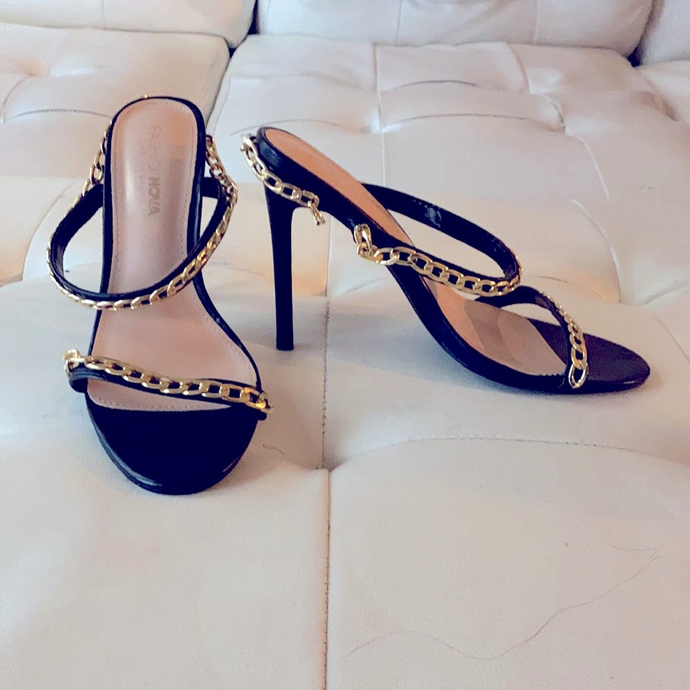 Black and gold heels